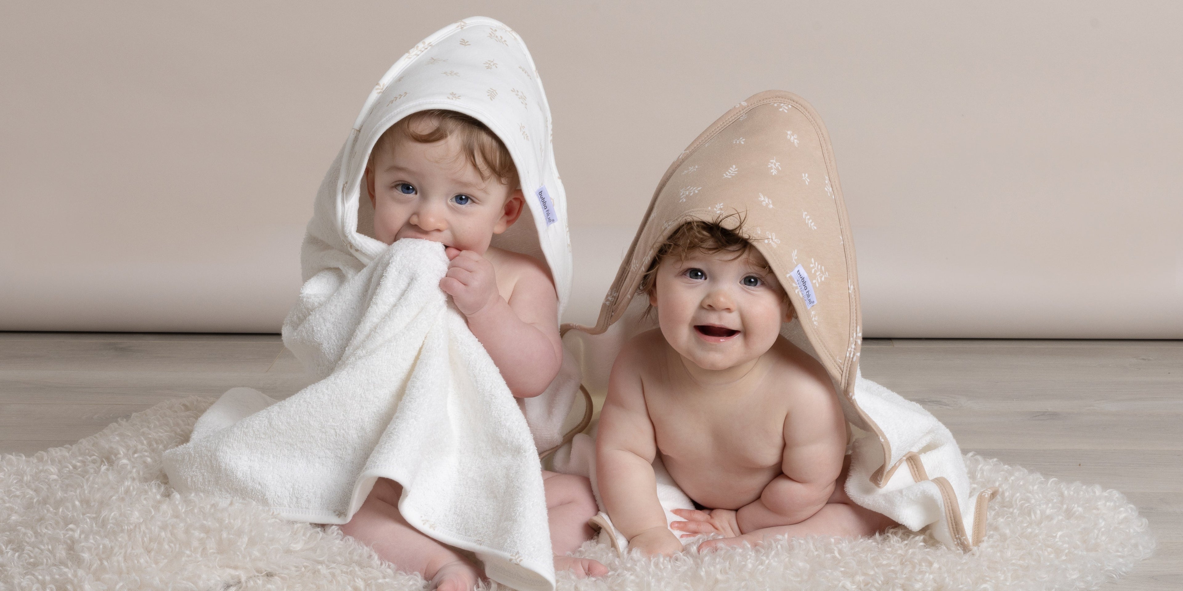 cute baby in a nordic print hooded towel