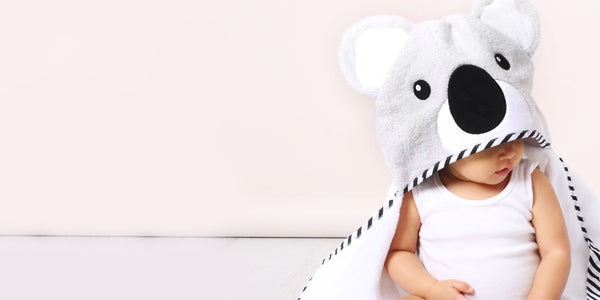 cute baby wearing a koala hooded towel