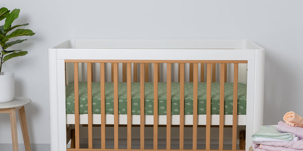 baby nursery with cot fitted sheet