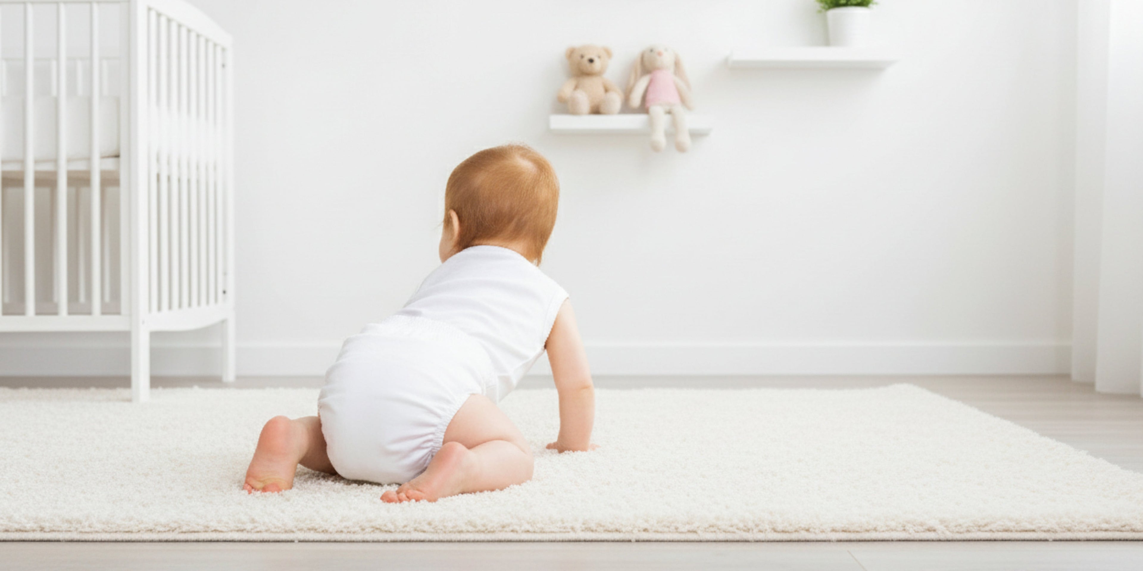 baby crawling with a reusable nappy
