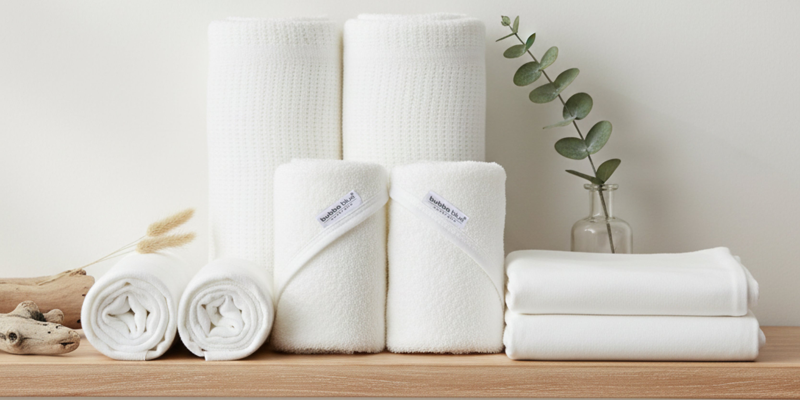 baby in a cute nursery cuddling bamboo viscose linen