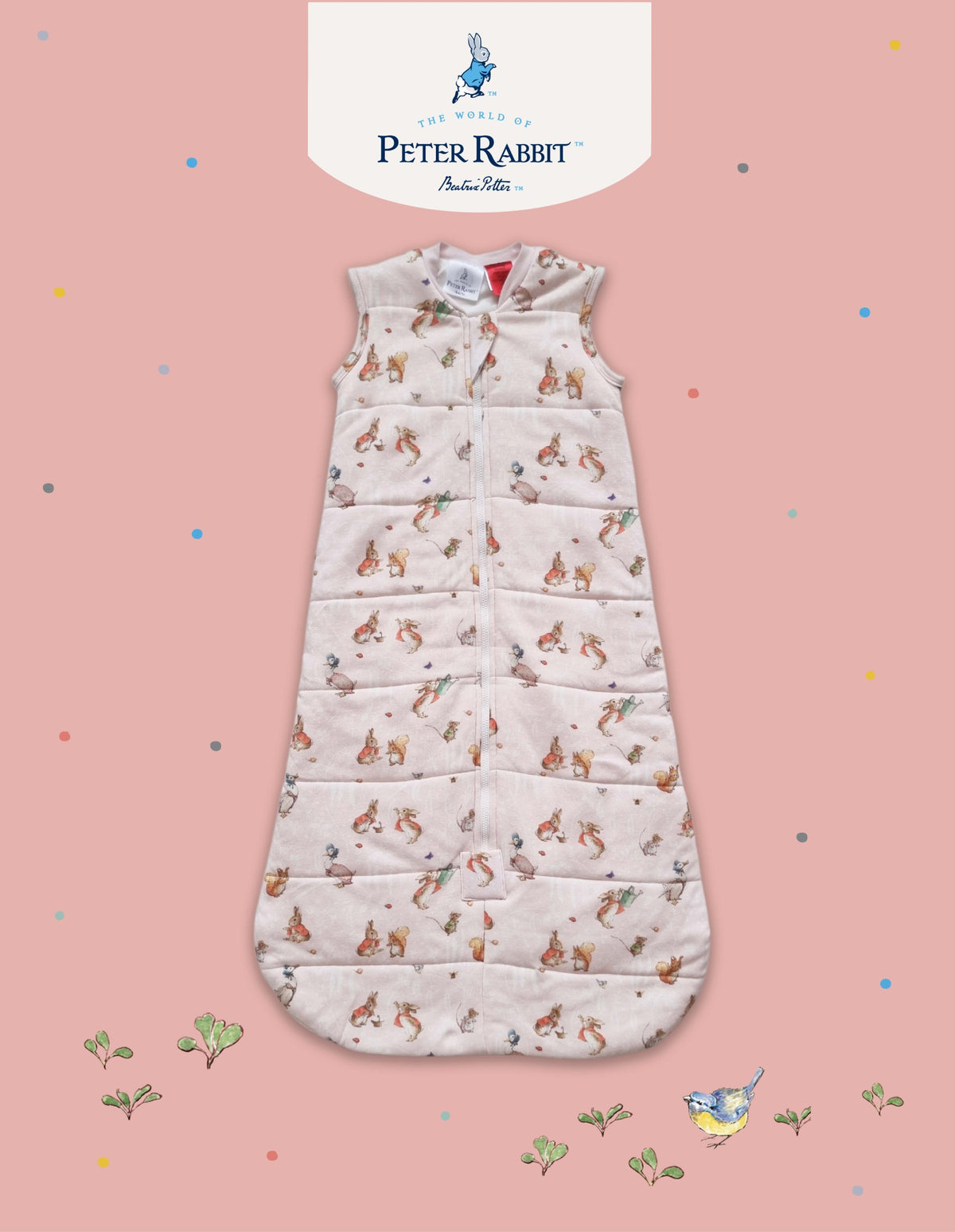 Baby sleeping bag with Peter Rabbit pattern on a pink background