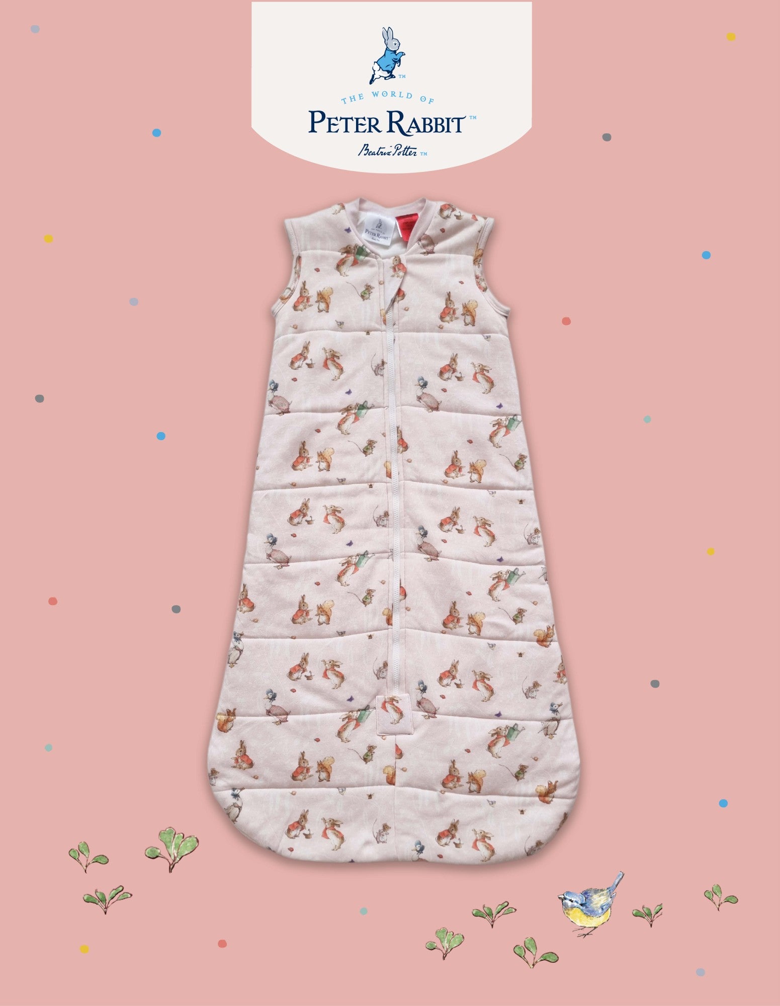 Baby sleeping bag with Peter Rabbit pattern on a pink background